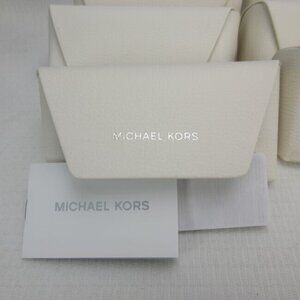 Genuine Michael Kors Glass Cases unused with leaflet
